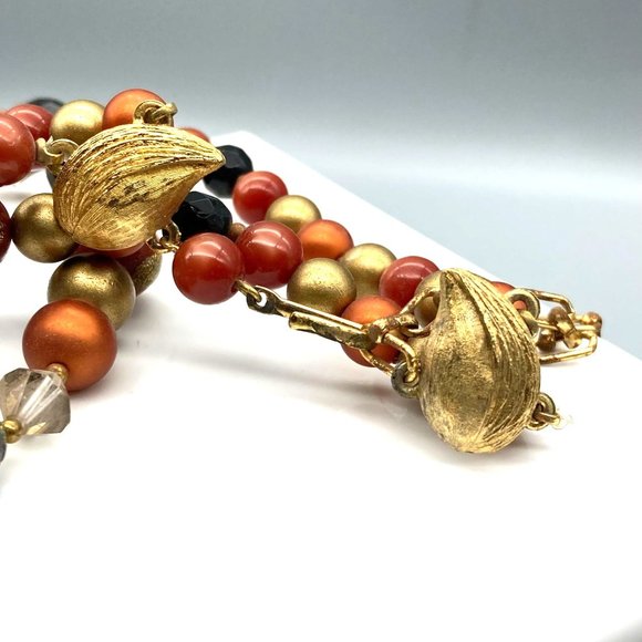 Shimmering Orange Moonglow Necklace with Golden and Black Glass Beads, Elegant - Picture 4 of 4